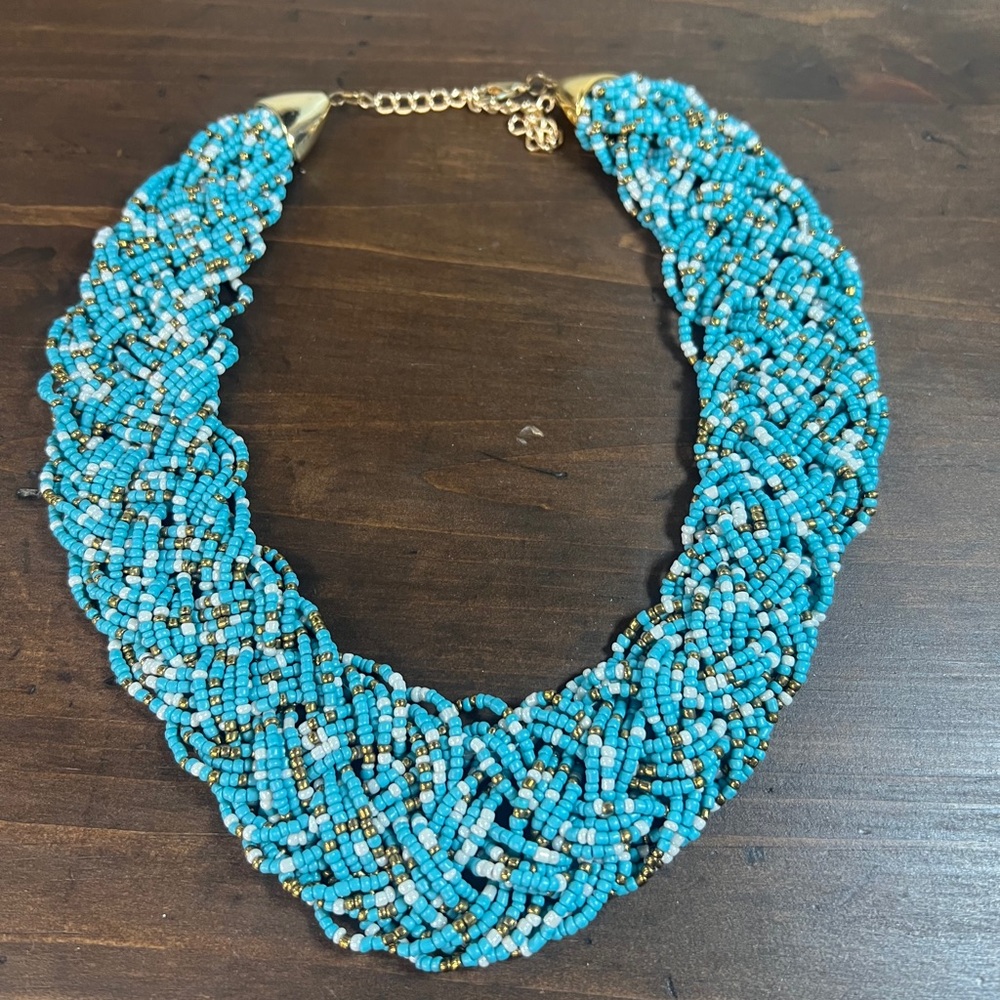 Turquoise multi-strand braided seed bead statement necklace.